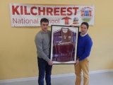<p>David Burke presenting  school principal Mr O Connor with the jersey </p>