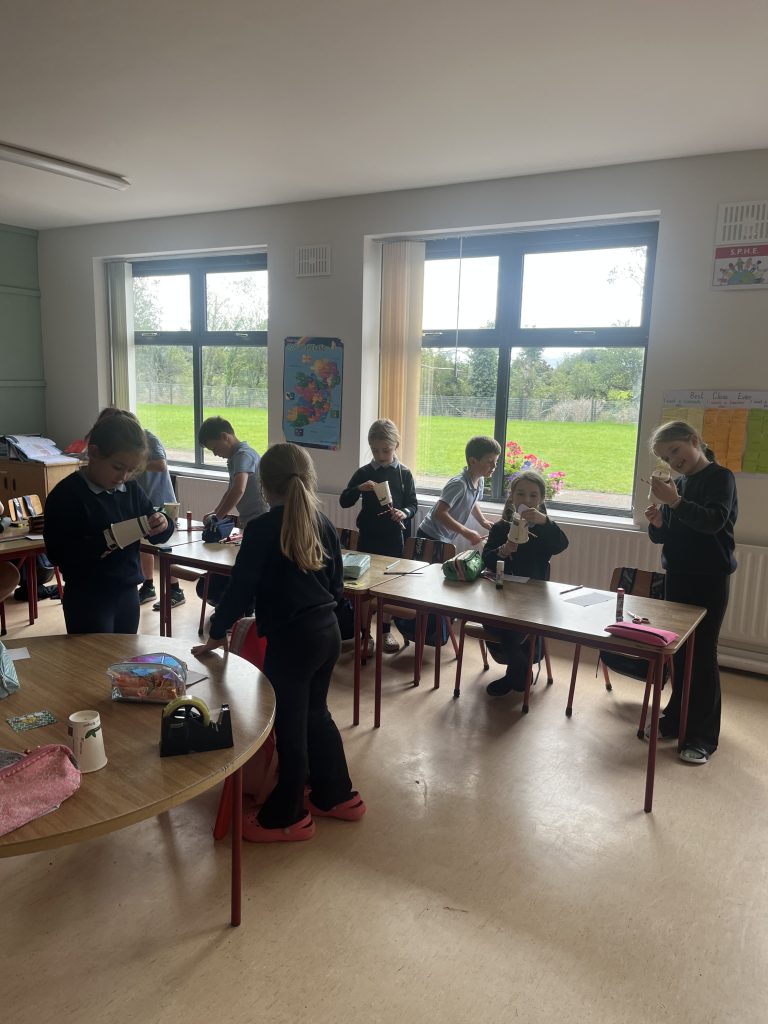 Learning image from Learning in action – Pupils making paper cup creations in the classroom